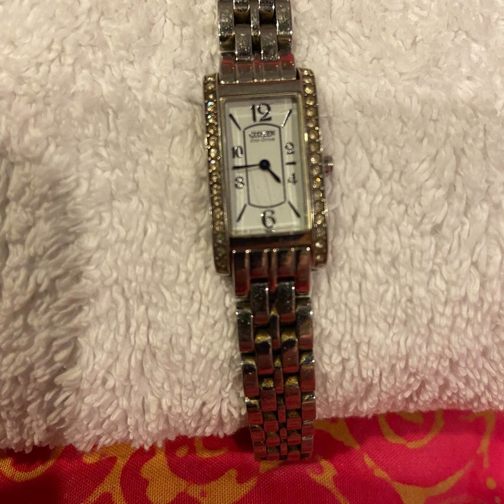 Slim silver Citizen Eco-drive watch with cubic zirconia